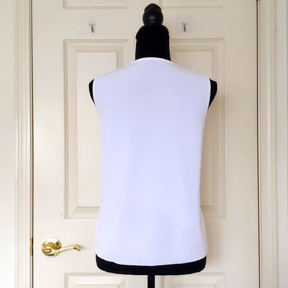 Front Floral Design of Rhinestones and Sparkles White Sleeveless Blouse. - Picture 5 of 5